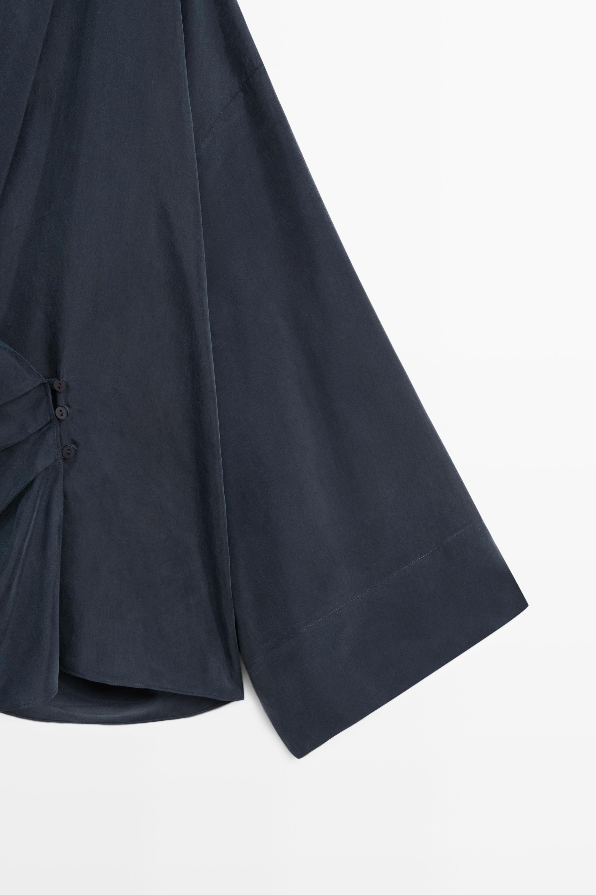 Flowing gathered wrap blouse